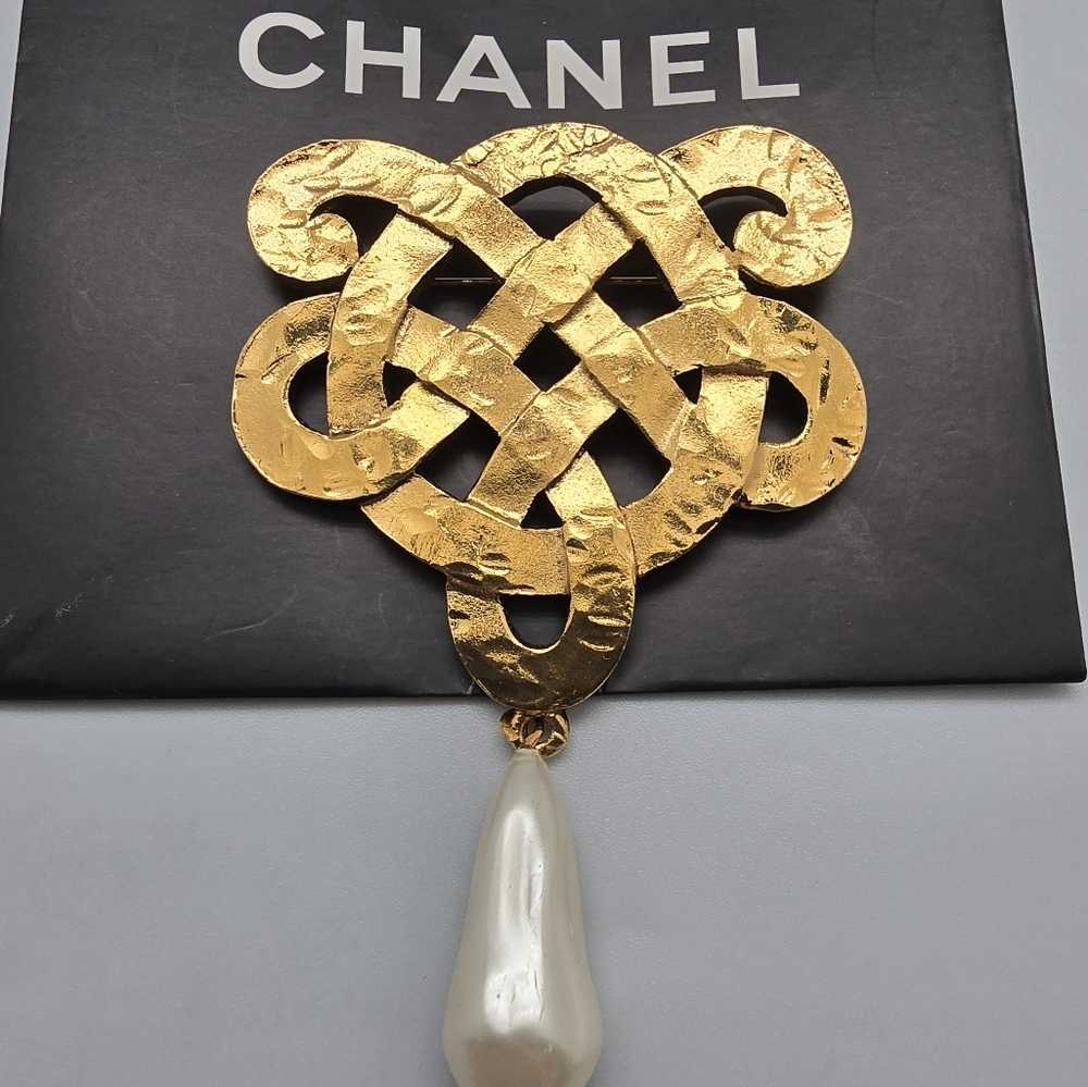 Vintage Chanel brass and simulated pearl drop knot Maison Goossens brooch, 1970s